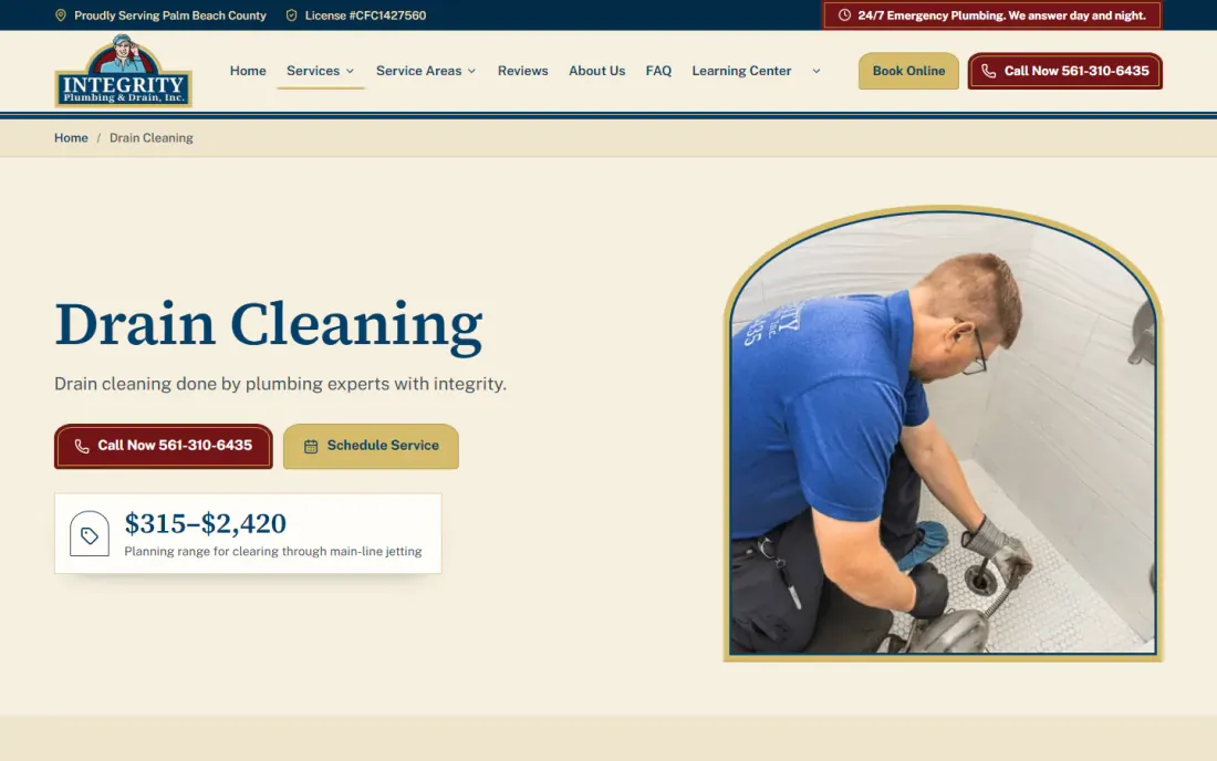 Integrity Plumbing and Drain drain cleaning page with a planning range of $315 to $2,420 under the headline and a photo of a technician clearing a shower drain